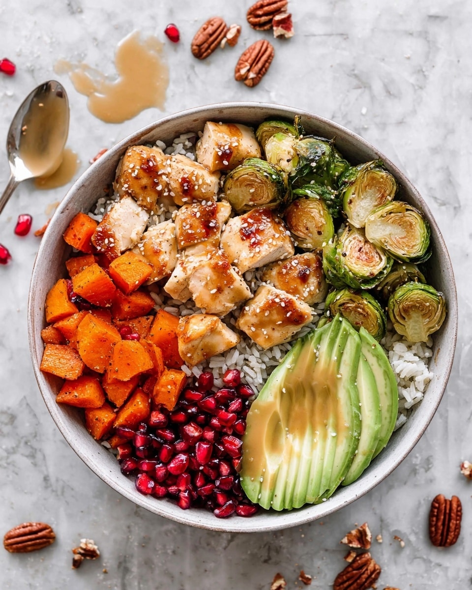 A white bowl filled with a colorful, healthy meal sits on a white marbled surface. At the bottom is a layer of white rice that spreads evenly across the bowl. On top, starting from the bottom left, are bright red pomegranate seeds clustered in a section. Moving clockwise, there are whole pecans with a smooth, brown texture. Next to the pecans are small, roasted Brussels sprouts with green and golden brown hues. Above them, bright orange, cubed roasted sweet potatoes make up another layer. On the right side of the bowl, fresh avocado slices with pale green shades fan out neatly. In the center, several pieces of grilled, light golden brown chicken are placed on top, showing grill marks and a slightly shiny texture from seasoning. Photo taken with an iphone --ar 4:5 --v 7