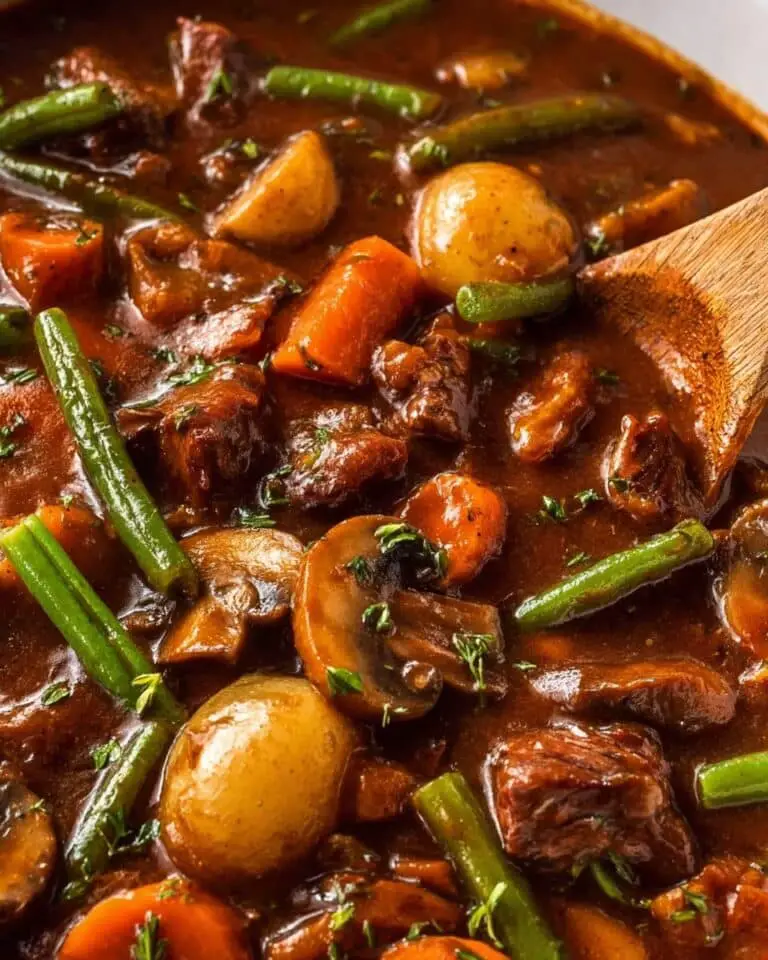 Hearty Chicken Stew with Vegetables and Tomato Broth Recipe