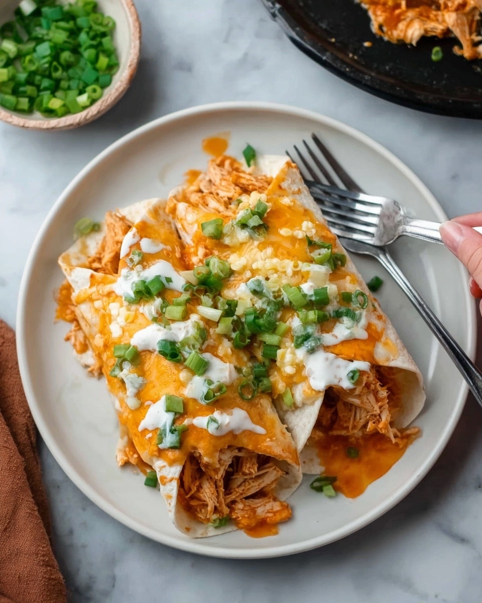 A white plate on a white marbled surface holds two soft tortillas filled with shredded cooked chicken, topped with melted bright orange cheddar cheese and a drizzle of creamy white sauce. Bright green chopped scallions are sprinkled on top of the cheese and sauce, adding a fresh contrast. There is extra sauce pooling slightly around the base of the tortillas. Next to the plate, a woman’s hand holds a fork, ready to eat. In the background, there is a small white bowl with more chopped green scallions. photo taken with an iphone --ar 4:5 --v 7