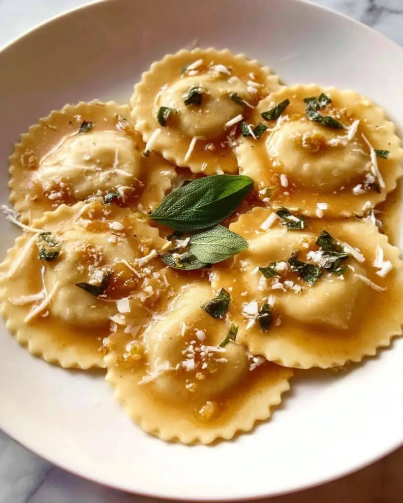 Butternut Squash Ravioli with Sage Walnut Filling and Wine Sauce Recipe