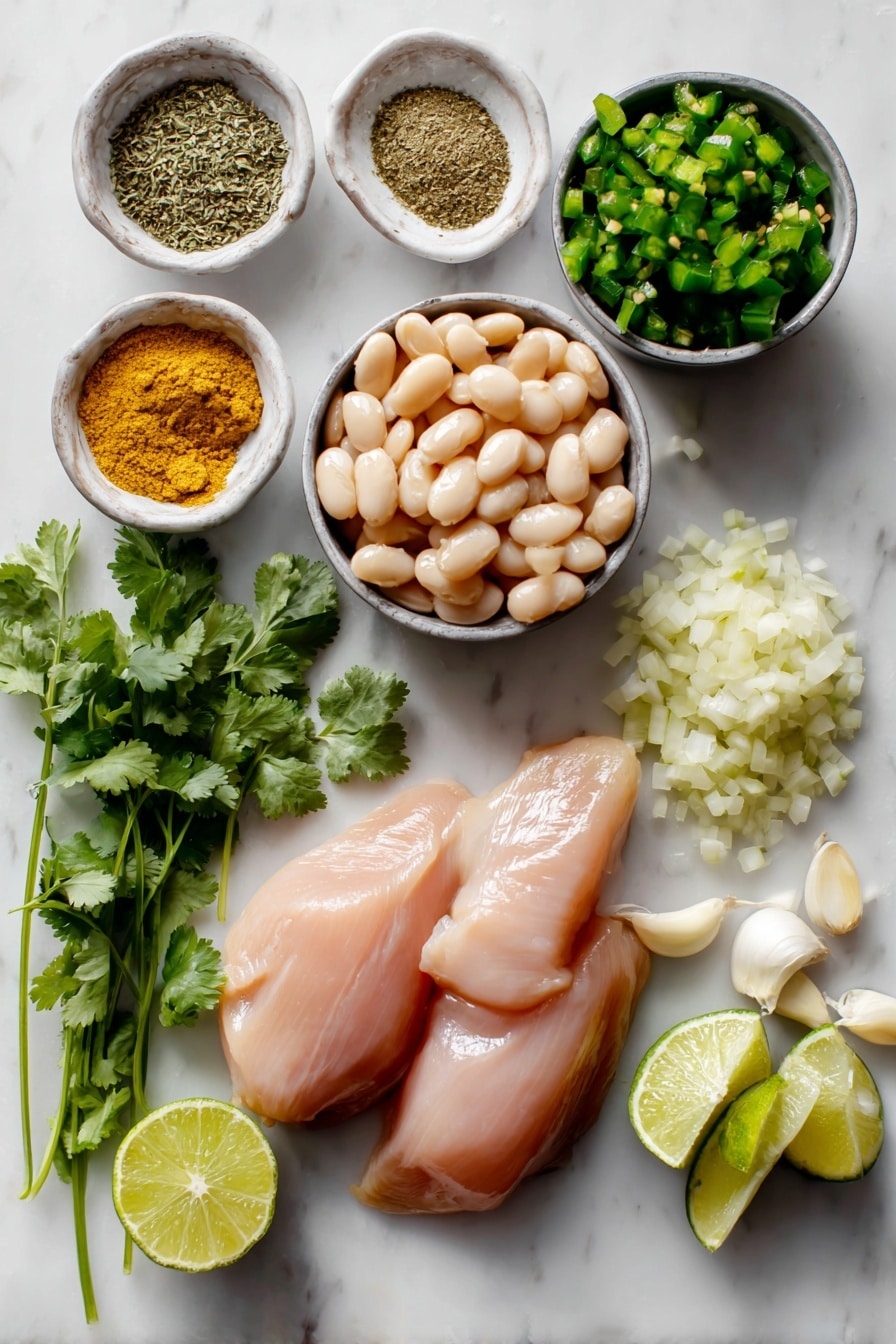Flat lay of boneless skinless chicken breasts, cans of white beans with some beans spilled out, diced green chiles in a small heap, minced garlic cloves, finely diced yellow onion, fresh cilantro sprigs, fresh lime wedges cut in halves and quarters, and ground cumin and dried oregano sprinkled in small piles, all beautifully arranged on a white marble surface, photo taken with an iphone --ar 2:3 --v 7 - Crockpot White Chicken Chili, Easy White Chicken Chili, Healthy Crockpot Chili, Creamy White Chicken Chili, Crockpot Chicken and Beans