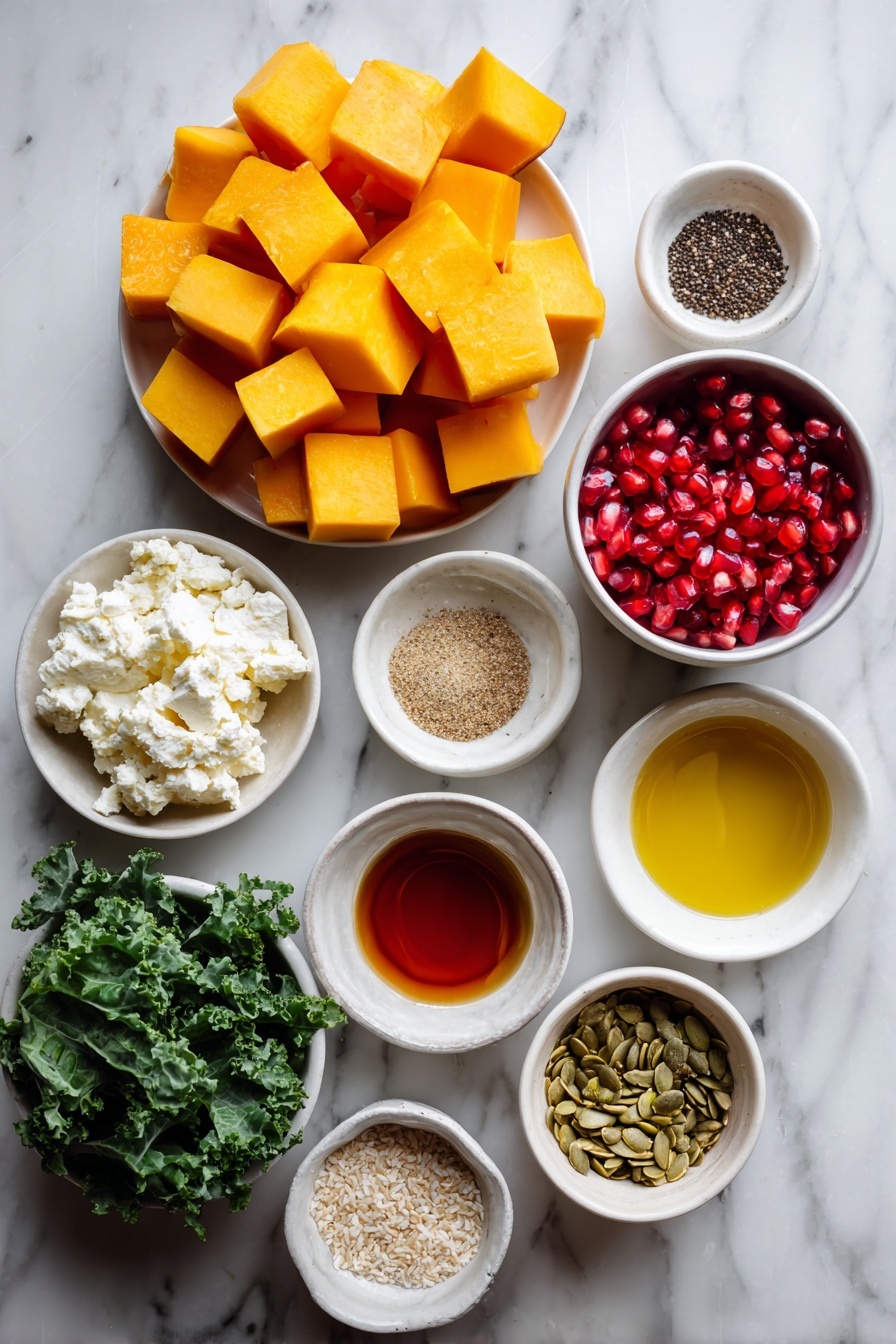 Flat lay of a small pile of cubed butternut squash, a medium red apple sliced into chunks, a handful of baby kale leaves, a small white ceramic bowl of ruby red pomegranate seeds, a small white ceramic bowl of crumbled white feta cheese, a small white ceramic bowl of toasted pepitas, two whole brown eggs with clean shells, a small white ceramic bowl with golden olive oil, a small white ceramic bowl with amber apple cider vinegar, and a small white ceramic bowl holding grainy Dijon mustard, small white ceramic bowls containing light brown Italian seasoning, fine white garlic powder, coarse white salt, and black peppercorns placed symmetrically on a clean white marble surface, soft natural light, photo taken with an iPhone, professional food photography style, fresh ingredients, white ceramic bowls, no bottles, no duplicates, no utensils, no packaging --ar 2:3 --v 7 --p m7354615311229779997 - Roasted Butternut Squash and Apple Salad, fall salad recipe, healthy roasted vegetable salad, easy autumn salad, flavorful winter salad