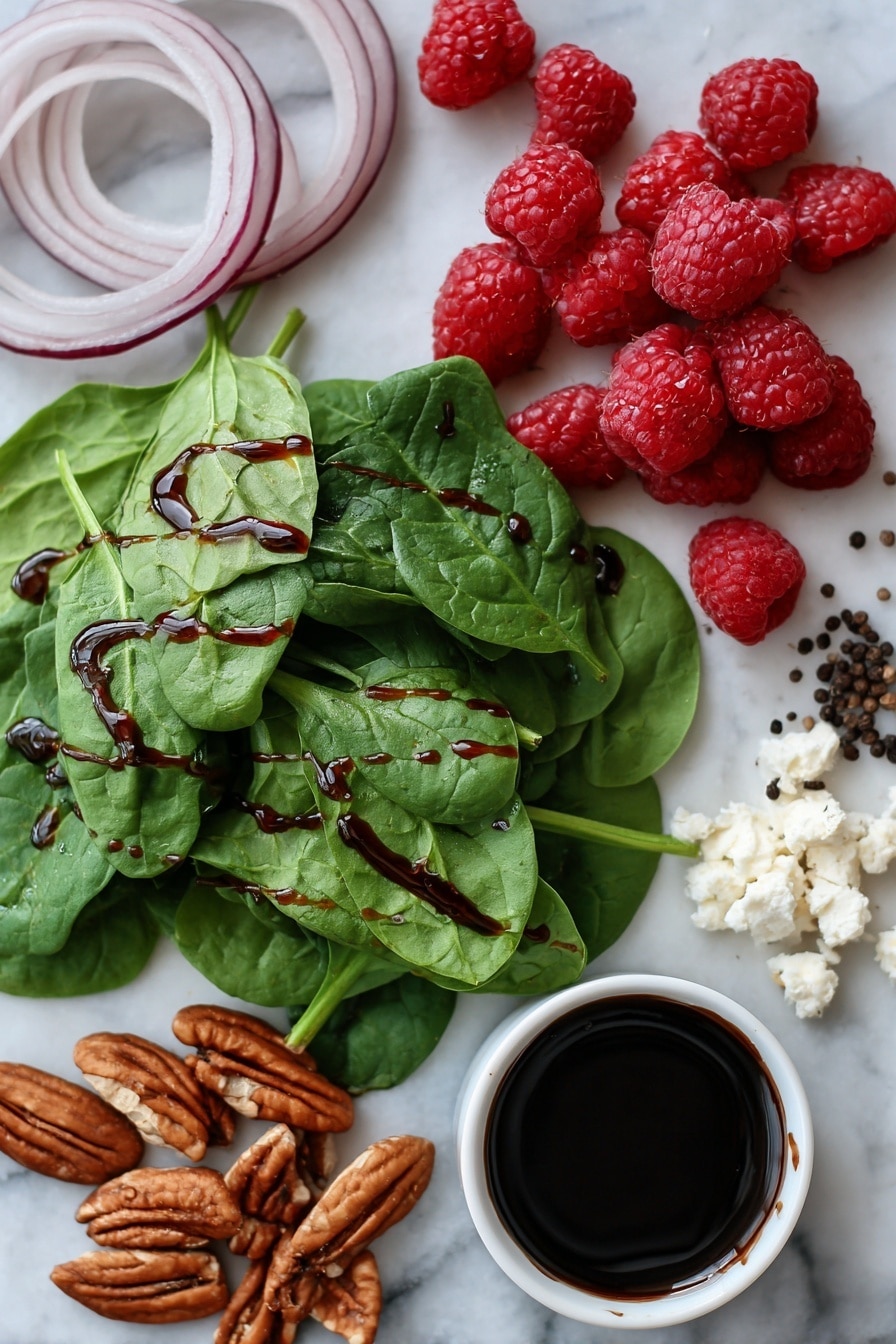 Flat lay of fresh baby spinach leaves, thinly sliced red onion rings, crumbled creamy goat cheese, toasted pecan halves, bright red fresh raspberries, a small pile of coarse black peppercorns, and a drizzle of dark balsamic glaze elegantly spread in a thin line, all beautifully arranged on a white marble surface, photo taken with an iphone --ar 2:3 --v 7 - Sweet and Tangy Spinach Salad with Goat Cheese, Raspberries, and Toasted Pecans, spinach salad with goat cheese and raspberries, easy fruit and nut salad recipes, healthy berry spinach salad, quick gourmet salad ideas