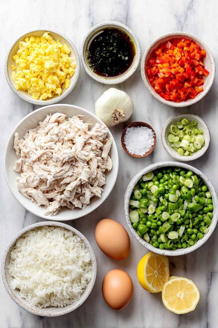 Flat lay of a small white ceramic bowl of neutral avocado oil, a peeled and diced yellow onion, a finely chopped red bell pepper, two peeled garlic cloves, a small white bowl of fresh green frozen peas, a small pile of cooked shredded white chicken meat, a small white bowl of sesame oil, a neat mound of boiled and cooled long-grain rice, two whole uncracked brown eggs, a small white bowl of dark soy sauce, a small pinch of salt beside the bowls, half a fresh lemon cut with visible juice, and a small bunch of chopped spring onions arranged symmetrically, placed on a clean white marble surface, soft natural light, photo taken with an iPhone, professional food photography style, fresh ingredients, white ceramic bowls, no bottles, no duplicates, no utensils, no packaging --ar 2:3 --v 7 --p awthu7i m7354615311229779997 - Quick Chicken Fried Rice, easy chicken fried rice, fast fried rice recipe, beginner-friendly fried rice, leftover chicken dinner