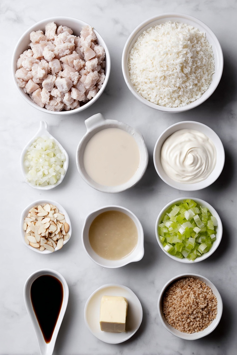 Flat lay of cooked diced turkey pieces, cooked white rice grains in a small white ceramic bowl, a small white bowl of creamy condensed mushroom soup, a small white bowl filled with clear chicken broth, a small white bowl with smooth, pale mayonnaise, a small white bowl holding thick, white sour cream, a small pile of finely diced small onion, a small pile of finely diced celery stalks, a heap of slivered almonds, a small white bowl containing coarse crushed Ritz cracker crumbs, and a small white bowl with melted golden butter, all ingredients fresh and natural, arranged symmetrically in perfect proportions in simple white ceramic bowls, placed on a clean white marble surface, soft natural light, photo taken with an iPhone, professional food photography style, fresh ingredients, white ceramic bowls, no bottles, no duplicates, no utensils, no packaging --ar 2:3 --v 7 --p m7354615311229779997 - Leftover Turkey Rice Casserole, turkey leftover casserole, easy turkey casserole, comforting turkey dinner, holiday turkey leftovers recipe