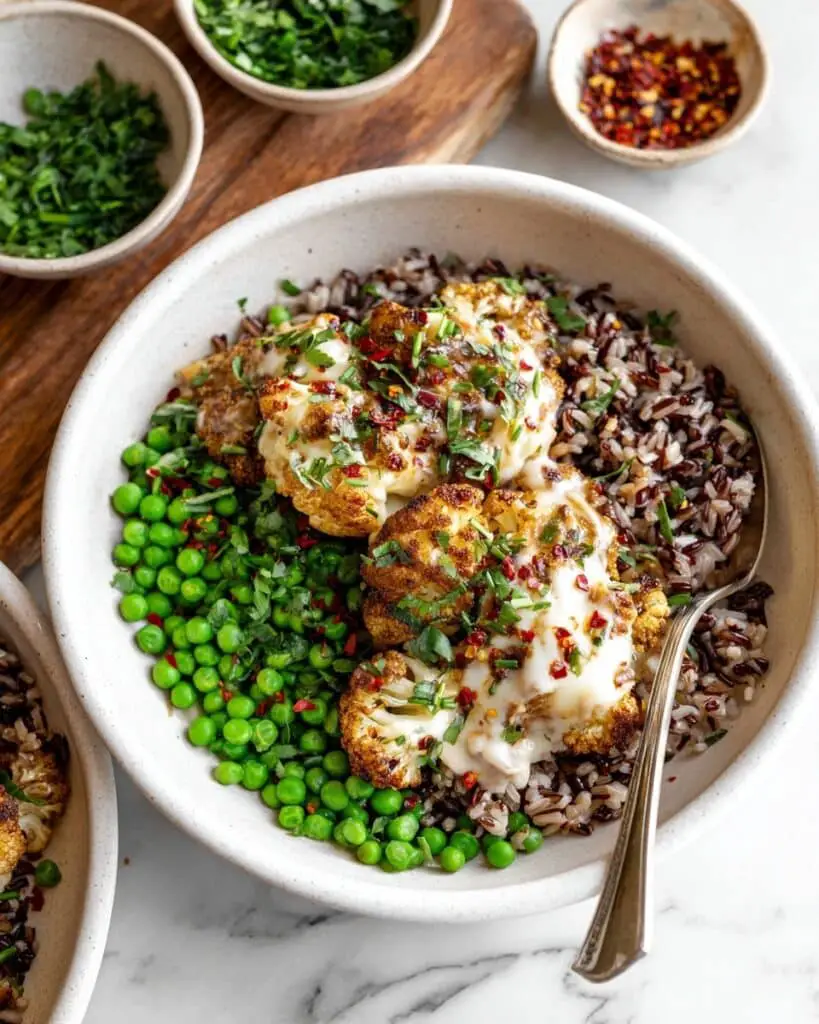 French Onion Chicken Bowls with Rice, Peas, and Melted Gruyère Recipe