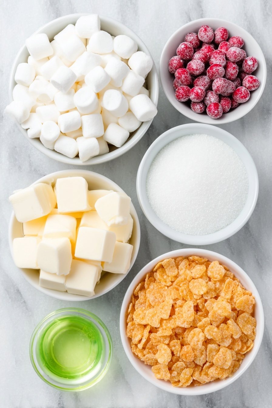 Flat lay of a small white ceramic bowl of salted butter cubes, a small white ceramic bowl filled with white mini marshmallows, a small white ceramic bowl with clear vanilla extract, a small white ceramic bowl containing vibrant green liquid food coloring, a neat pile of golden cornflakes, and a cluster of shiny red cinnamon imperials (red hots) candies, all arranged in perfect symmetry, placed on a clean white marble surface, soft natural light, photo taken with an iPhone, professional food photography style, fresh ingredients, white ceramic bowls, no bottles, no duplicates, no utensils, no packaging --ar 2:3 --v 7 --p m7354615311229779997 - Cornflake Wreaths, holiday treat ideas, festive Christmas treats, quick holiday snacks, easy no-bake holiday desserts