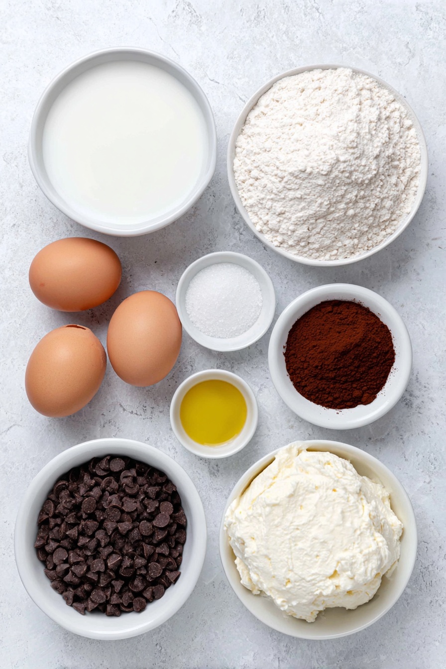 Flat lay of a small white ceramic bowl of whole milk, a small white ceramic bowl with white vinegar, a small white ceramic bowl with golden vegetable oil, a small white ceramic bowl of all-purpose flour, a small white ceramic bowl of deep reddish-brown cocoa powder, a small white ceramic bowl of light brown sugar, two whole uncracked brown eggs with clean shells, a small white ceramic bowl of white baking powder, a small white ceramic bowl of fine white salt, a small white ceramic bowl of creamy white cream cheese, a small white ceramic bowl of fine white icing sugar, a small white ceramic bowl of mini dark chocolate chips placed symmetrically on a clean white marble surface, soft natural light, photo taken with an iPhone, professional food photography style, fresh ingredients, white ceramic bowls, no bottles, no duplicates, no utensils, no packaging --ar 2:3 --v 7 --p m7354615311229779997 - Red Velvet Mug Cake, mug cake recipes, quick red velvet dessert, mini red velvet cake, easy microwave cake