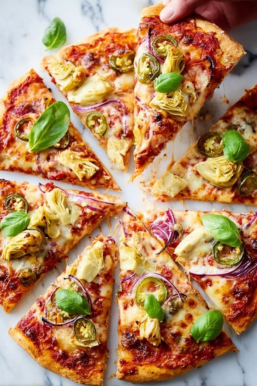 A round pizza sliced into eight pieces on a white marbled surface, each slice topped with melted light golden cheese, chunks of pale yellow artichoke hearts, thin slices of red onion, small rings of green jalapeno, and bits of red tomato sauce underneath the cheese. Bright green fresh basil leaves are scattered on top of the slices, adding a pop of color. The crust is golden brown and slightly crisped at the edges, showing some browning and texture. A woman's hand is pulling one slice away, stretching a thin string of melted cheese between the slice and the rest of the pizza. photo taken with an iphone --ar 2:3 --v 7 - Vegetarian Roasted Red Pepper Pizza, vegetarian pizza recipe, roasted red pepper pizza, easy vegetarian pizza, flavorful pizza recipe