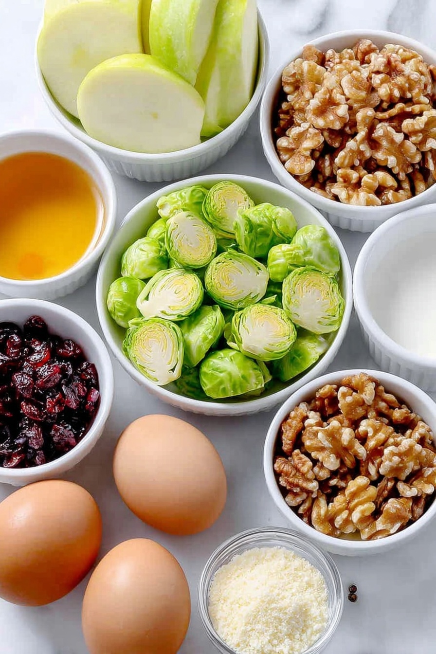 Flat lay of thinly sliced bright green Brussels sprouts, a crisp green Granny Smith apple sliced into matchstick pieces, a small pile of thinly sliced green onion rounds, a handful of plump dried cranberries, chopped toasted walnuts with rich browns and golden hues, a small white ceramic bowl with pale amber apple cider vinegar, a small white ceramic bowl with golden extra virgin olive oil, a small white ceramic bowl with deep amber pure maple syrup, a small white ceramic bowl filled with fine grated off-white Pecorino Romano cheese, two whole eggs with clean brown shells, coarse salt and black peppercorns neatly scattered, all arranged in perfect symmetry on a simple white ceramic plate, placed on a clean white marble surface, soft natural light, photo taken with an iPhone, professional food photography style, fresh ingredients, white ceramic bowls, no bottles, no duplicates, no utensils, no packaging --ar 2:3 --v 7 --p m7354615311229779997 - Brussels Sprouts Apple Cranberry Salad, seasonal healthy salad, holiday veggie salad, apple cranberry Brussels sprouts, festive winter salad