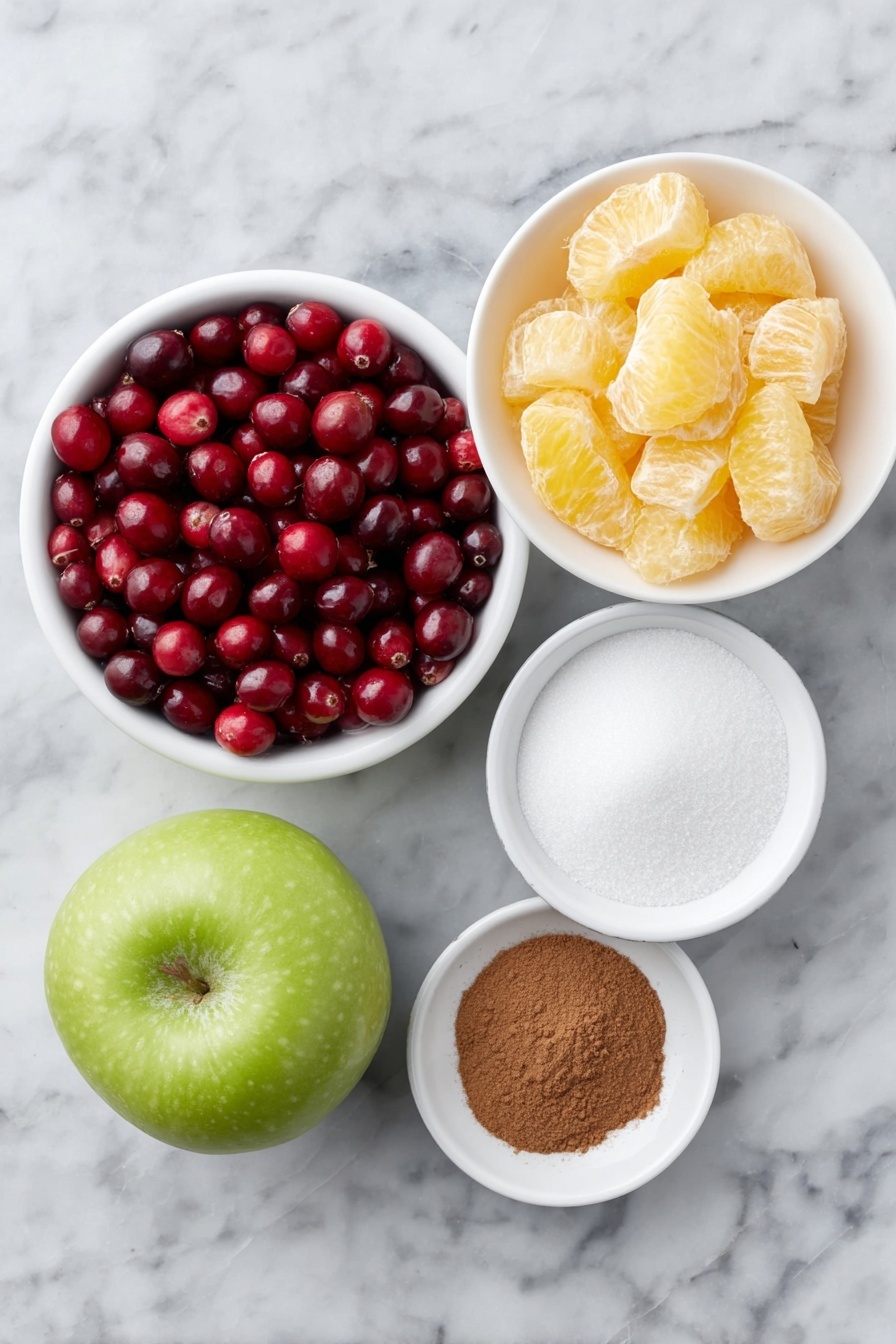 Flat lay of fresh whole cranberries, a small whole navel orange cut into chunky pieces showing its bright peel and juicy segments, a whole Granny Smith apple quartered with crisp green skin, a small white ceramic bowl filled with white granulated sugar, and a tiny white ceramic bowl containing warm brown ground cinnamon, all arranged in perfect symmetry on a clean white marble surface, soft natural light, photo taken with an iPhone, professional food photography style, fresh ingredients, white ceramic bowls, no bottles, no duplicates, no utensils, no packaging --ar 2:3 --v 7 --p m7354615311229779997 - Easy Cranberry Orange Relish, cranberry orange relish, holiday side dish, festive cranberry recipes, citrus cranberry condiment