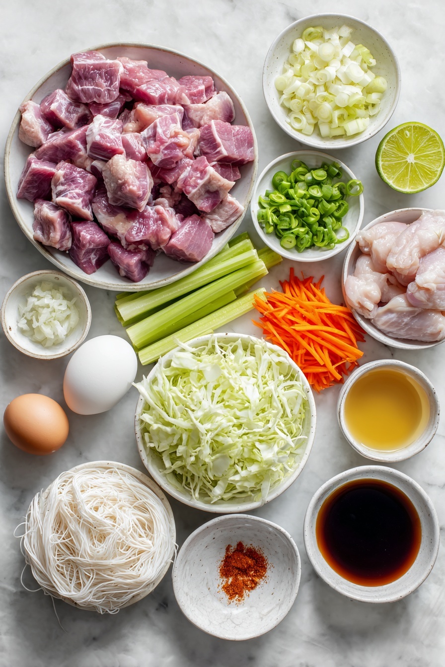 Flat lay of fresh cubed raw pork shoulder in pinkish tones, fresh cubed raw boneless chicken thighs with pale pink skin on some pieces, a medium-sized peeled yellow onion julienned into thin strips, several peeled garlic cloves finely minced, a small mound of bright orange julienned carrots, two ribs of celery thinly sliced on bias with crisp green color, a small pile of thinly sliced sugar snap peas in vibrant green, green cabbage roughly chopped into 1-inch pieces revealing crisp white and pale green layers, a small white ceramic bowl with glossy dark oyster sauce, a small white ceramic bowl of shiny soy sauce, a small white ceramic bowl with golden neutral-flavored oil, a small white ceramic bowl containing clear chicken stock, a neatly coiled bundle of dry vermicelli noodles in fine thin strands, one whole uncracked brown egg, a small white ceramic bowl with granulated white sugar, a halved fresh lime showing vibrant green flesh, a small white ceramic bowl with ground orange-red achiote powder, all arranged in perfect symmetry and balanced proportions, placed on a clean white marble surface, soft natural light, photo taken with an iPhone, professional food photography style, fresh ingredients, white ceramic bowls, no bottles, no duplicates, no utensils, no packaging --ar 2:3 --v 7 --p m7354615311229779997 - Easy Chicken and Pork Pancit, Filipino Pancit Recipe, Simple Chicken and Pork Noodles, Quick Filipino Stir-Fry, Savory Pancit with Chicken and Pork