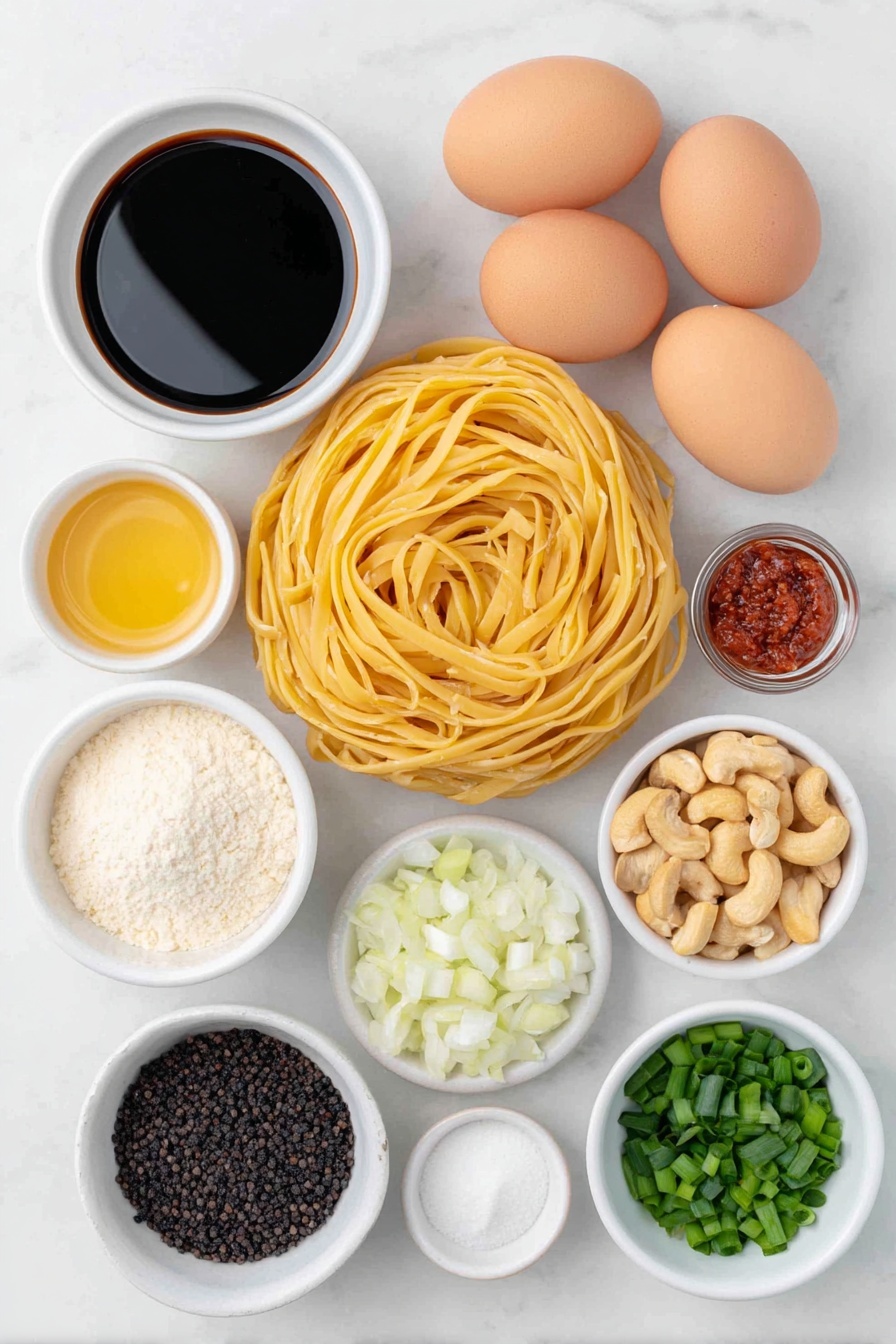 Flat lay of a small pile of dry linguine pasta strands, a few fresh king oyster mushrooms with smooth white stems and tan caps, a half small red bell pepper diced into neat cubes, two whole uncracked brown eggs, a halved small white onion diced finely, two scallions sliced into two-inch pieces with white parts separated from bright green tops, three whole dried red chiles, a small handful of roasted cashews, a few whole Szechuan peppercorns, and three small white ceramic bowls each filled with clear water, dark soy sauce, and glossy red chili bean paste, placed on a clean white marble surface, soft natural light, photo taken with an iPhone, professional food photography style, fresh ingredients, white ceramic bowls, no bottles, no duplicates, no utensils, no packaging --ar 2:3 --v 7 --p m7354615311229779997 - Vegan Kung Pao Pasta with Mushrooms, vegan pasta recipes, vegan Asian fusion dishes, plant-based pasta with mushrooms, spicy vegan pasta