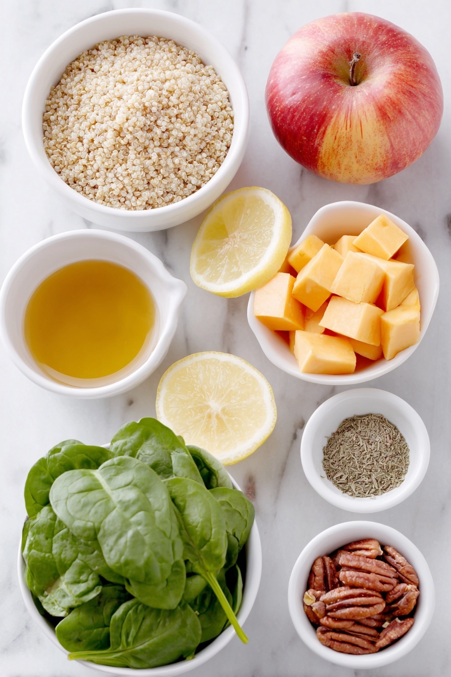 Flat lay of dry quinoa grains in a small white ceramic bowl, cubed bright orange butternut squash pieces in a simple white bowl, fresh vibrant green spinach leaves loosely arranged beside the bowls, a whole medium red and yellow apple sliced to show its crisp interior on a white ceramic plate, cooked beige chickpeas placed in a small white bowl, roughly chopped toasted pecans in another white bowl, a small white bowl containing golden olive oil, a small white bowl filled with pale amber apple cider vinegar, a small white dish holding fresh lemon juice, a tiny white bowl with a drizzle of maple syrup, and a pinch of ground cinnamon and dried sage each sprinkled neatly on separate small white dishes, all ingredients fresh and natural, arranged with perfect symmetry and realistic proportions, placed on a clean white marble surface, soft natural light, photo taken with an iPhone, professional food photography style, fresh ingredients, white ceramic bowls, no bottles, no duplicates, no utensils, no packaging --ar 2:3 --v 7 --p m7354615311229779997 - Roasted Butternut Squash Quinoa Salad, healthy fall salads, easy quinoa salad recipes, roasted vegetable salads, nutritious winter salads