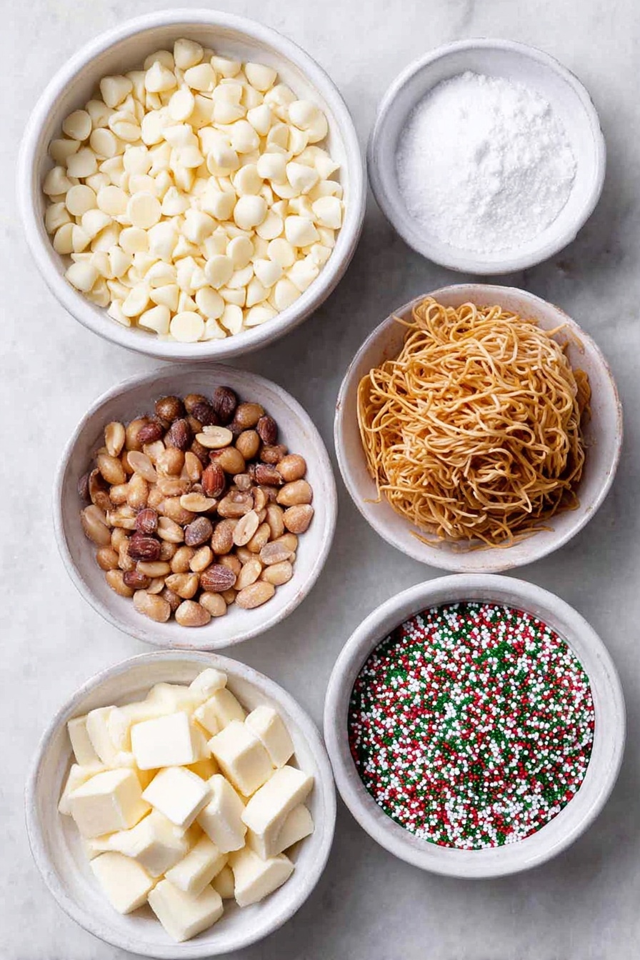 Flat lay of a small pile of smooth, creamy white chocolate chips, a handful of shiny salted peanuts with golden brown skins, a neatly arranged nest of crispy, thin chow mein noodles, and a small white ceramic bowl filled with colorful Christmas sprinkles in red, green, white, and gold, all spaced evenly on a simple white ceramic plate and bowls, placed on a clean white marble surface, soft natural light, photo taken with an iPhone, professional food photography style, fresh ingredients, white ceramic bowls, no bottles, no duplicates, no utensils, no packaging --ar 2:3 --v 7 --p m7354615311229779997 - Holiday Chocolate Peanut Noodle Cookies, easy holiday cookies, festive dessert recipes, quick peanut noodle treats, chocolate peanut cookies