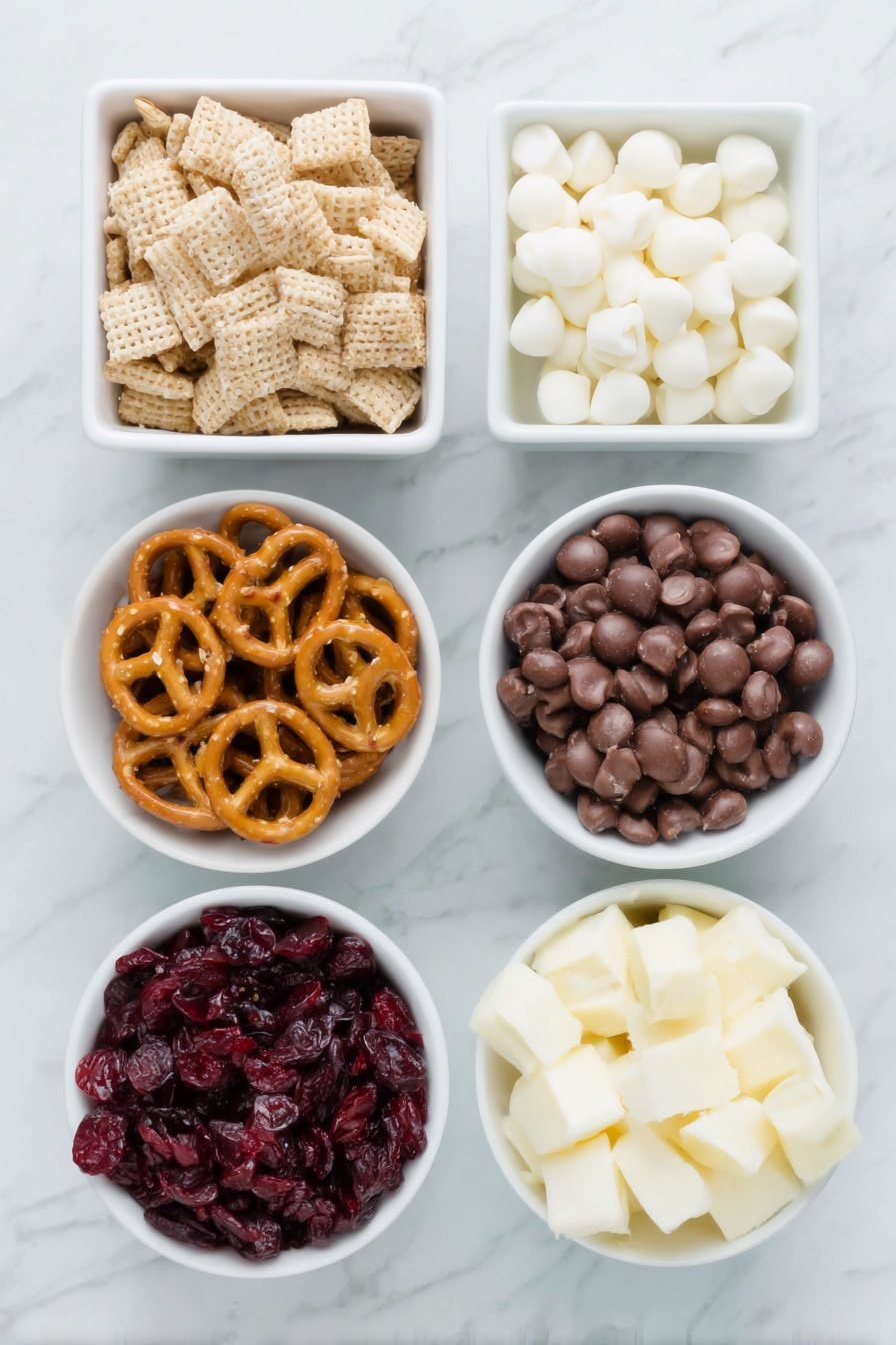 Flat lay of a small mound of rice Chex cereal, a neat pile of Cheerios, a small cluster of twisted pretzels, a handful of colorful M&M candies, a small bowl filled with plump dried cranberries, and a small white ceramic bowl containing smooth white chocolate chips, all arranged symmetrically on a clean white marble surface, soft natural light, photo taken with an iPhone, professional food photography style, fresh ingredients, white ceramic bowls, no bottles, no duplicates, no utensils, no packaging --ar 2:3 --v 7 --p m7354615311229779997 - White Chocolate Party Mix, white chocolate snack mix, sweet salty party mix, easy holiday treat, crunchy white chocolate snack