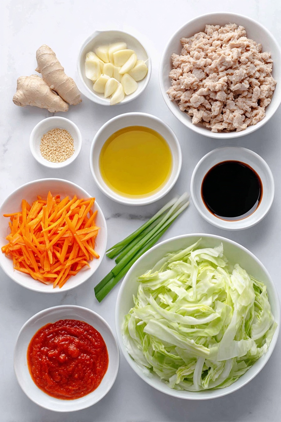 Flat lay of a small puddle of golden vegetable oil in a white ceramic bowl, a peeled garlic clove with a tiny chop beside it, a small pile of thinly peeled ginger slices, a mound of raw ground pork, a small white bowl holding amber toasted sesame oil, a quarter head of fresh green cabbage thinly sliced, half a yellow onion thinly sliced, a small heap of bright shredded orange carrot, a small white bowl filled with dark soy sauce, a small white bowl containing vivid red sriracha sauce, a few pinches of coarse kosher salt sprinkled nearby, a single fresh green scallion thinly sliced, and a small cluster of golden toasted sesame seeds all arranged symmetrically on a clean white marble surface, soft natural light, photo taken with an iPhone, professional food photography style, fresh ingredients, white ceramic bowls, no bottles, no duplicates, no utensils, no packaging --ar 2:3 --v 7 --p m7354615311229779997 - Egg Roll Bowls with Ground Pork, easy egg roll bowl recipe, quick Asian ground pork dinner, healthy egg roll bowls, weeknight ground pork recipes