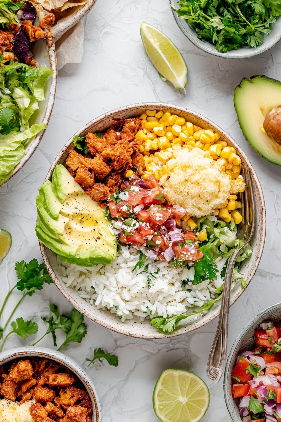 The dish is a bowl with multiple layers arranged side by side on a white marbled surface. The bottom layer is white rice with some green herbs mixed in, covering part of the bowl. On top left, there are small chunks of cooked reddish-brown meat. Next to the meat, there is a scoop of creamy yellow corn with visible black pepper. On the right side of the bowl, a layer of fresh, chopped green lettuce is piled up. Near the center, there is a mix of red diced tomatoes and onions covered partially with corn topping and sprinkled with white cheese crumbles. A few slices of green avocado fan out near the bottom left edge of the bowl, with a sprig of fresh green herbs next to it. There are two lime wedges resting on top of the rice and vegetables near the edge. A silver fork is placed inside the bowl on the right side. The white marbled background has other small bowls around it containing chopped lettuce, diced tomatoes, corn, and white cheese. Small green herb leaves are scattered around the scene. photo taken with an iphone --ar 2:3 --v 7 - Street Corn Chicken Rice Bowl, street corn chicken bowl, Mexican street corn rice bowl, flavorful chicken rice bowl, easy weeknight dinner recipes