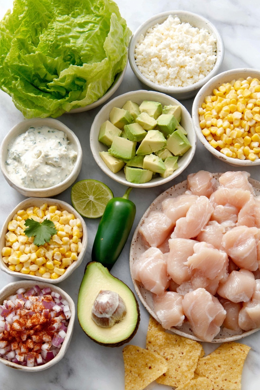 Flat lay of boneless skinless chicken breast pieces arranged neatly, a small mound of uncooked jasmine rice grains, fresh whole jalapeño pepper, a quarter of a ripe avocado diced, a handful of bright green cilantro leaves, a wedge of lime cut in half with visible juices, white ceramic bowls holding sweet yellow corn kernels, creamy light sour cream, light mayonnaise, crumbled white cotija cheese, and chili powder sprinkled on a small white bowl, accompanied by fresh green lettuce leaves, diced red onions, vibrant red pico de gallo, and scattered golden tortilla chips all placed on a clean white marble surface, soft natural light, photo taken with an iPhone, professional food photography style, fresh ingredients, white ceramic bowls, no bottles, no duplicates, no utensils, no packaging --ar 2:3 --v 7 --p m7354615311229779997 - Street Corn Chicken Rice Bowl, street corn chicken bowl, Mexican street corn rice bowl, flavorful chicken rice bowl, easy weeknight dinner recipes